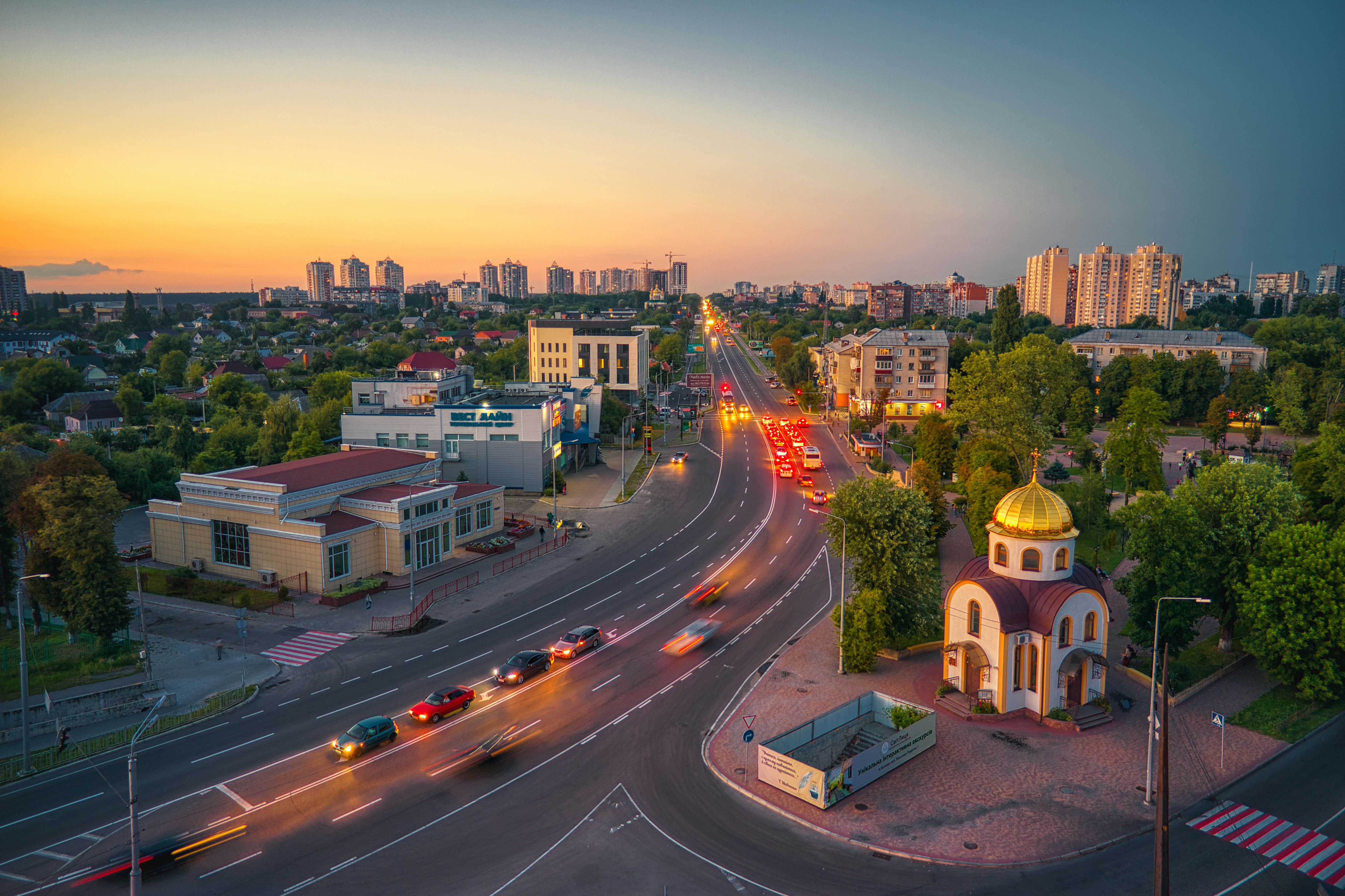 city with high rise buildings during night time