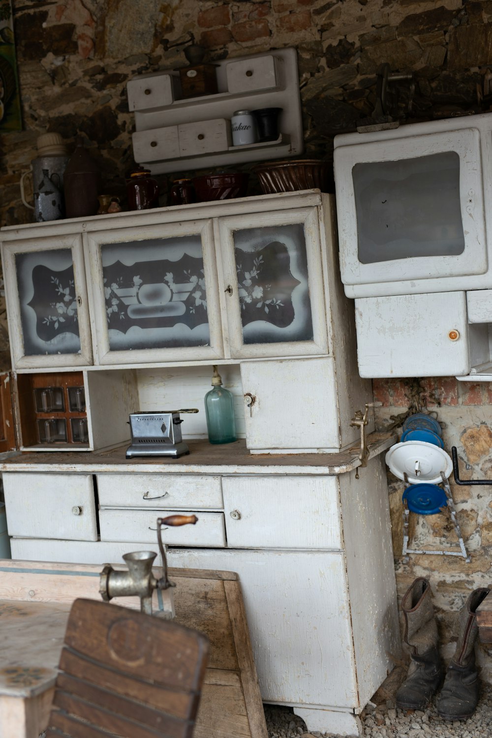 white wooden cabinet with mirror