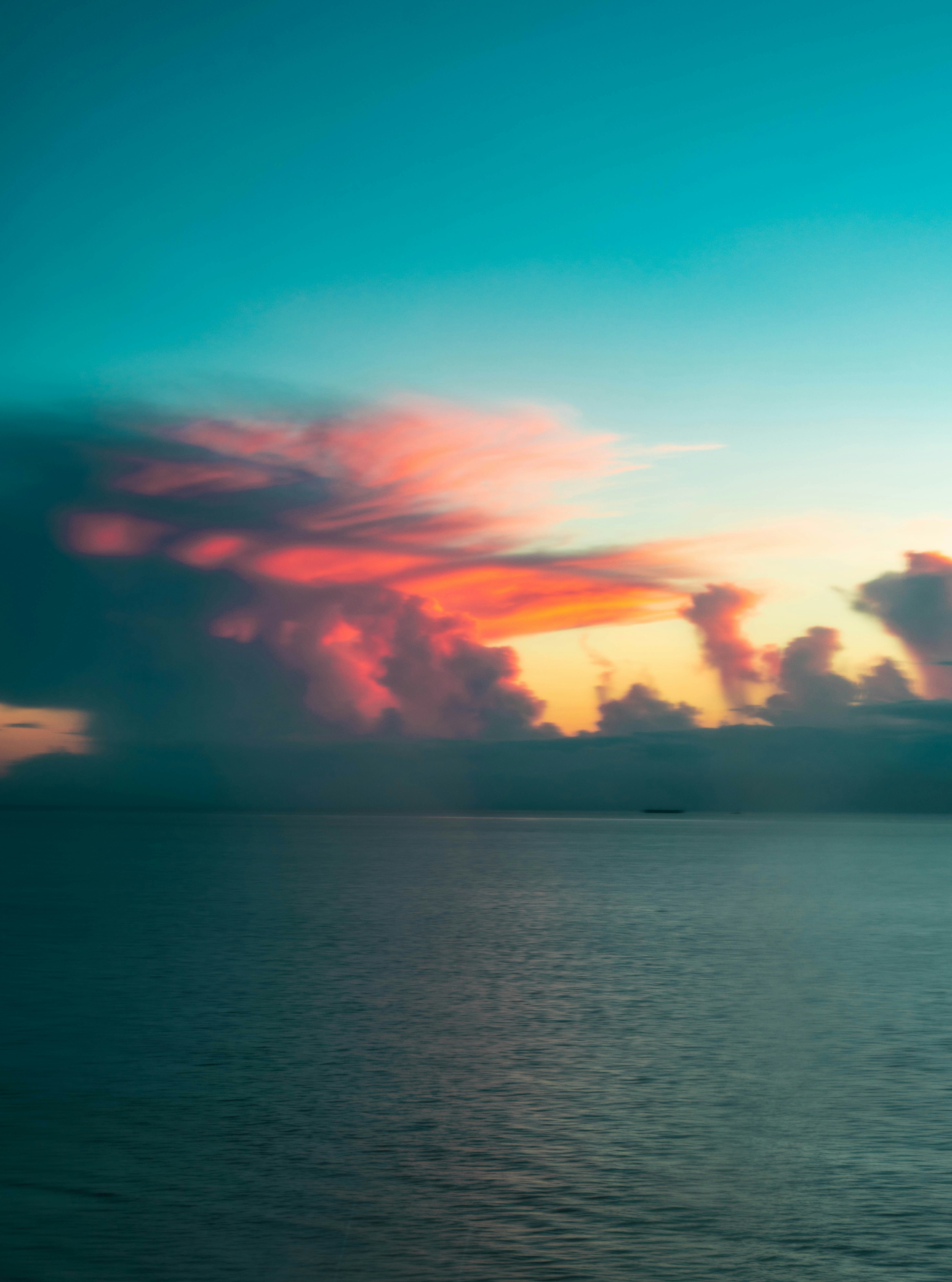 blue sea under blue sky during daytime