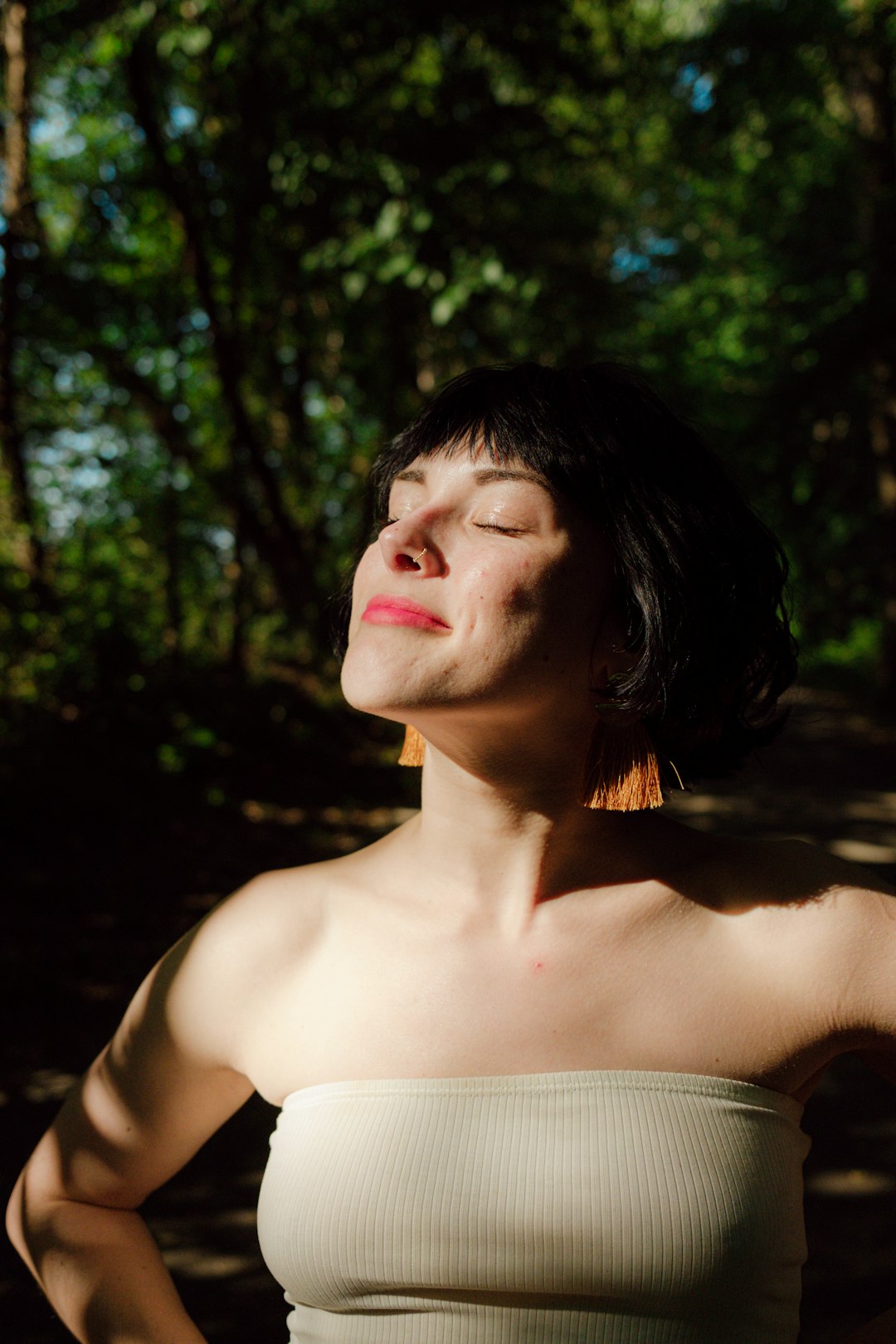 woman in white knit shirt