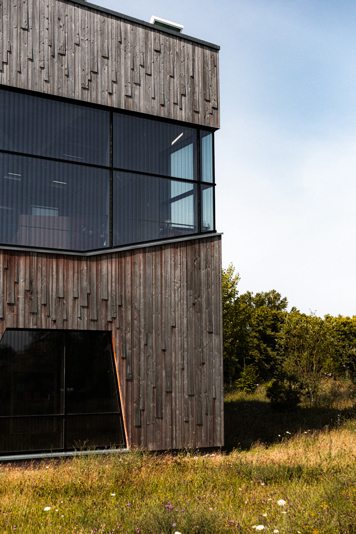 Architect-designed family home clad in vertical timber