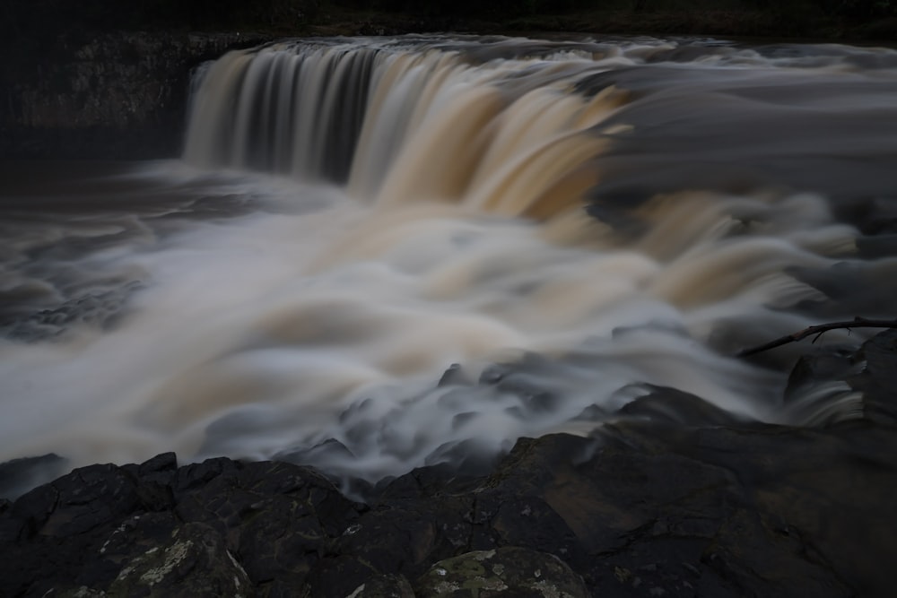 white water falls during daytime