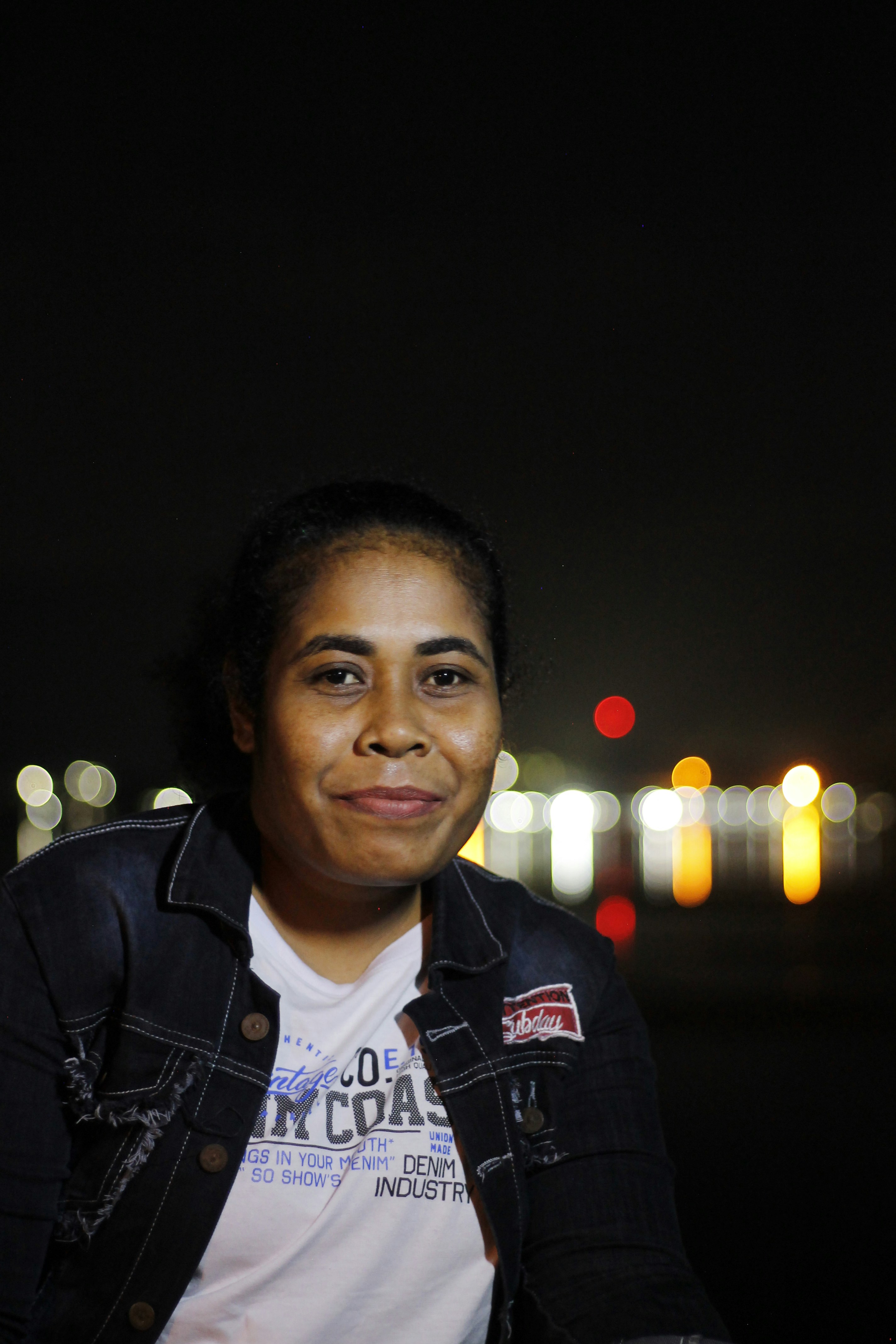 man in black leather jacket