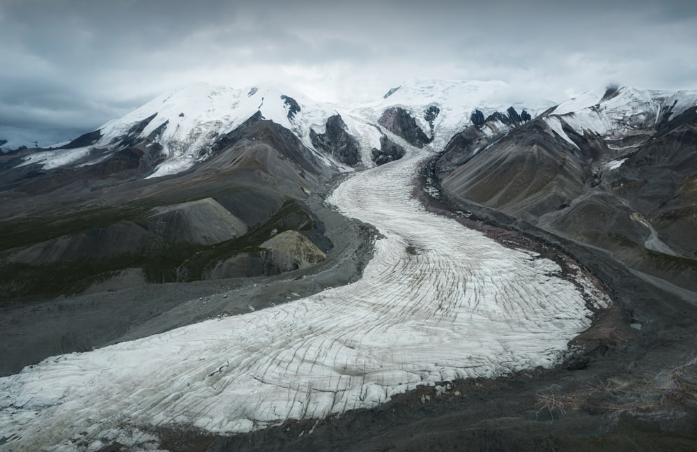 snow covered mountain during daytime