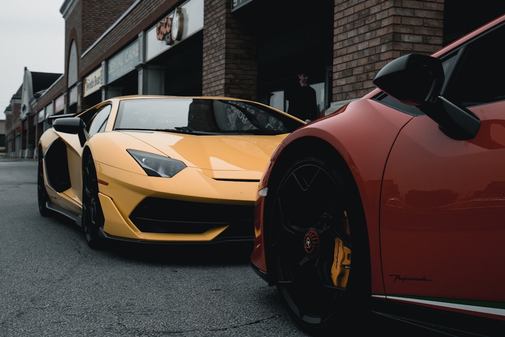 orange lamborghini aventador parked on street during daytime