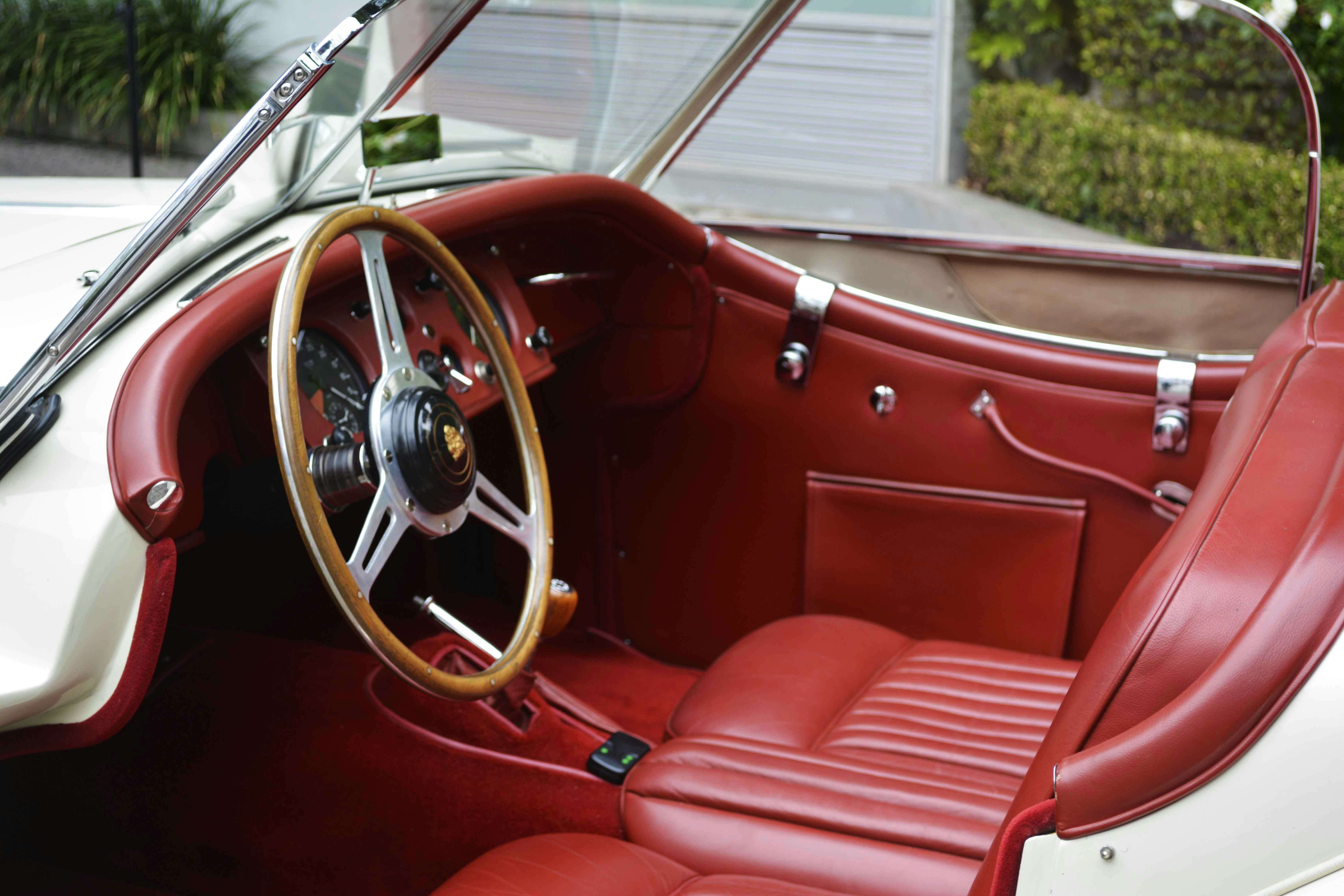 red and silver car steering wheel