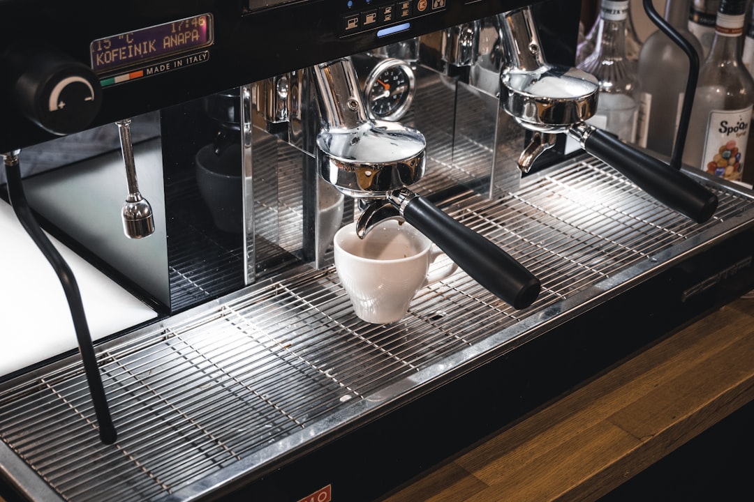 silver and black espresso machine