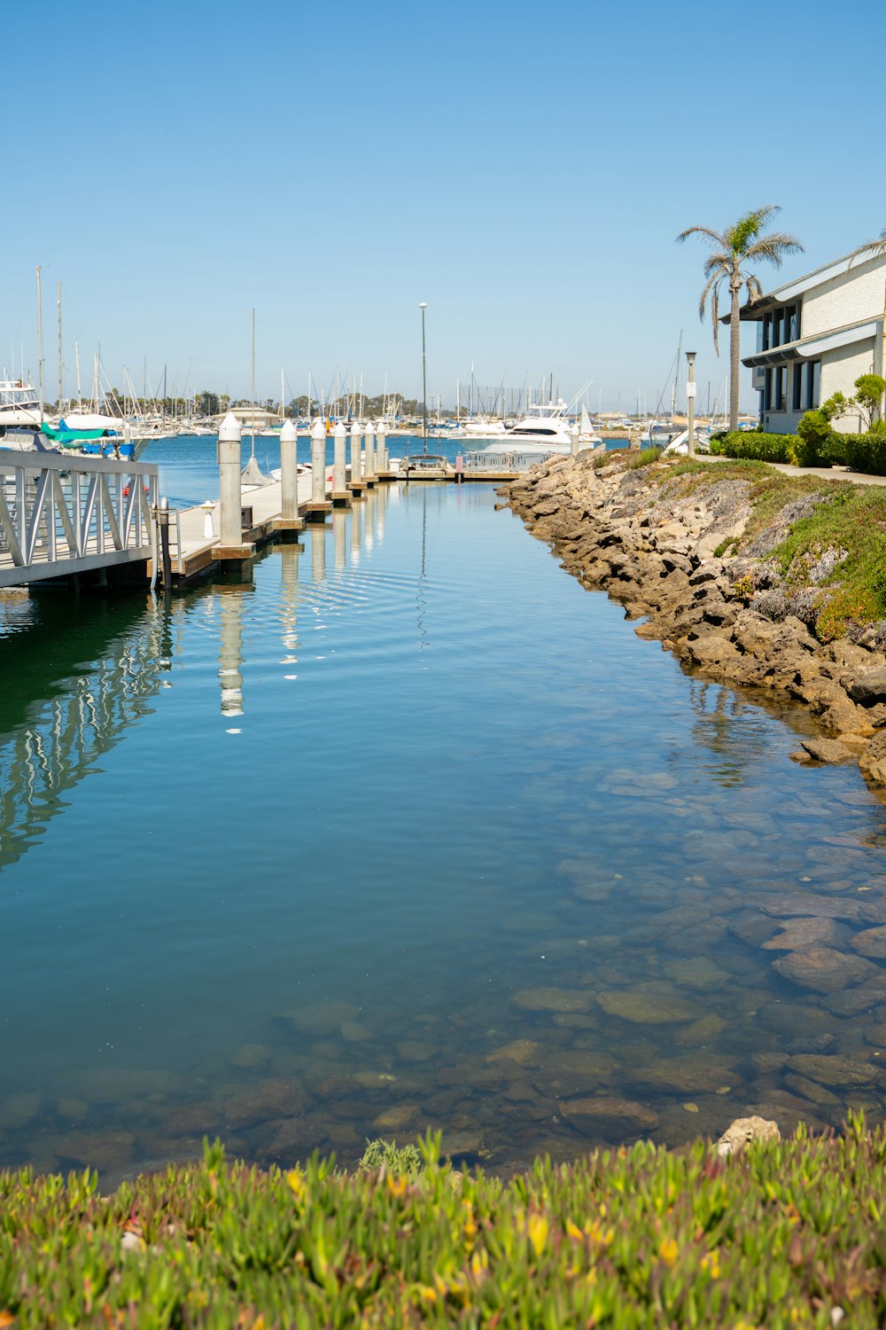 white boat on body of water during daytime