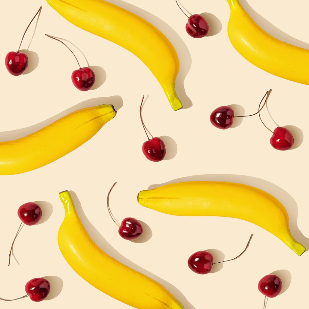 yellow banana fruit on brown wooden table