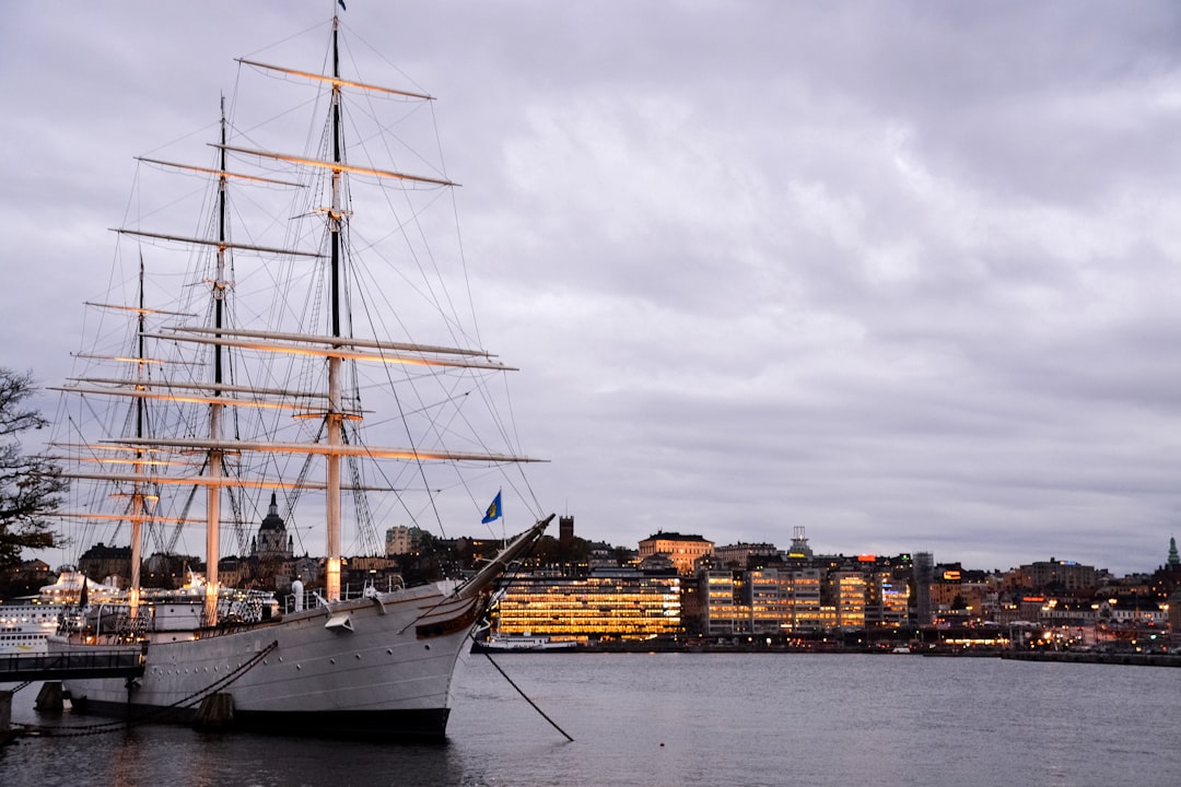 white and brown ship on dock during daytime