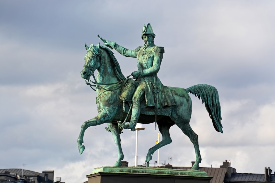 man riding on horse statue