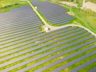 Rows of solar panels stretching across a large solar farm in China.