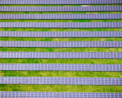 Solar panels installed on a farm, symbolizing sustainable energy consultancy.