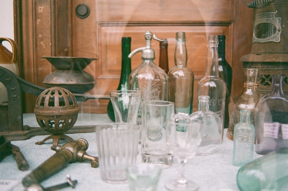 clear glass bottles on table