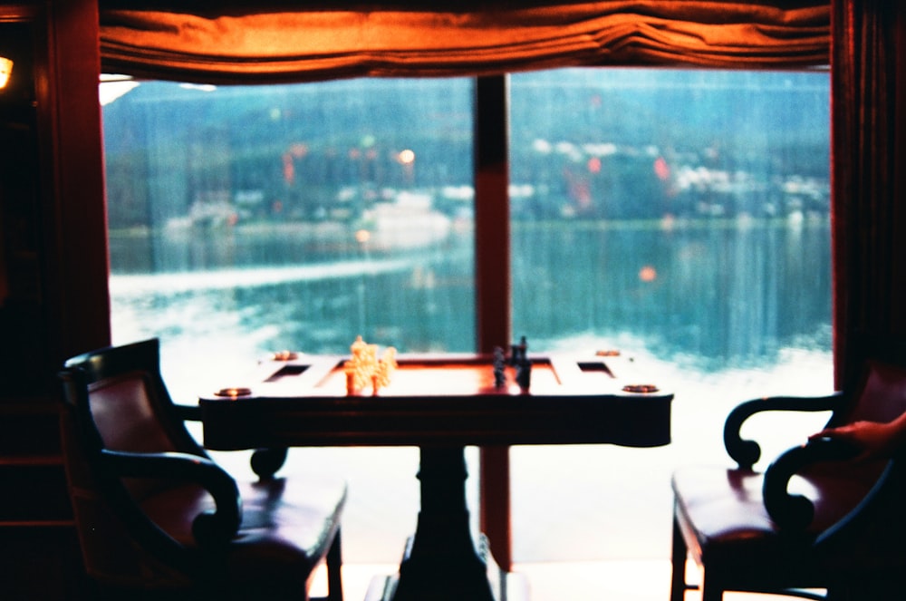 brown wooden table with chairs