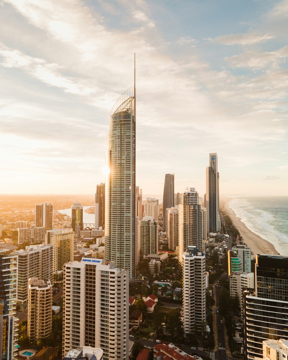 city skyline near sea during daytime