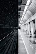 people walking on tunnel during daytime