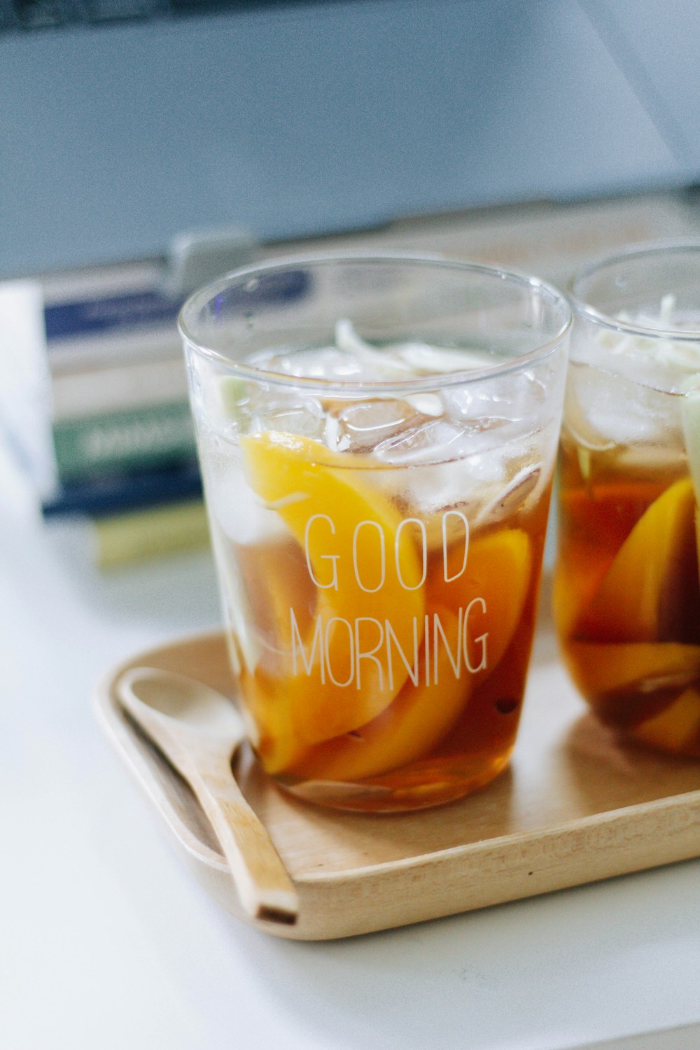 clear drinking glass with brown liquid