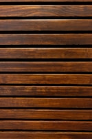 Handcrafted wooden bed frame with natural finish and simple design.