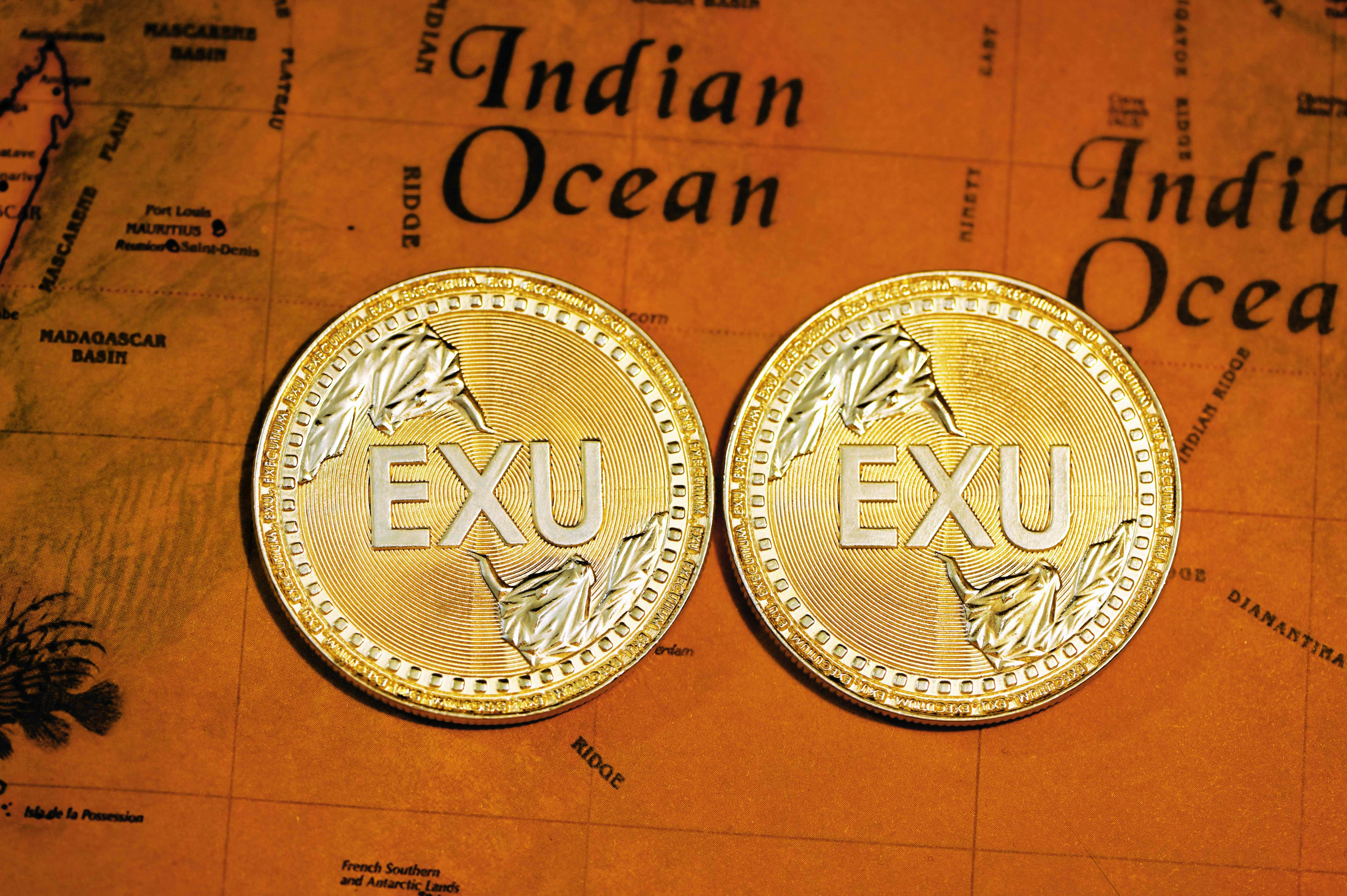 gold and silver round coin