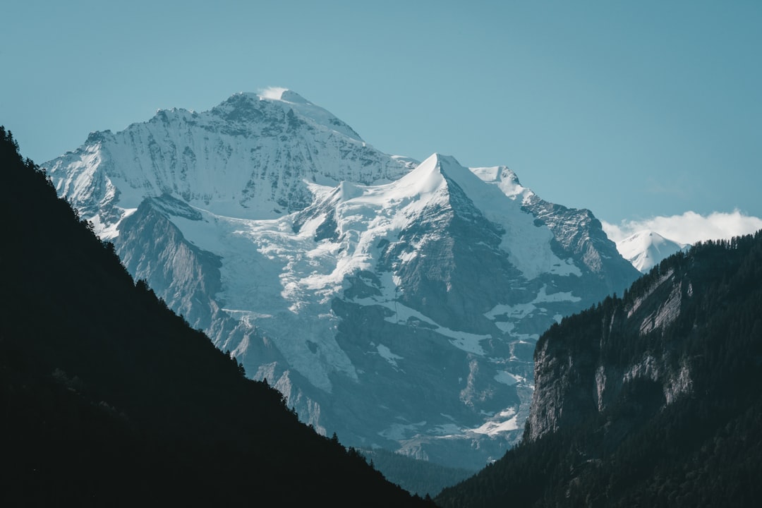 snow covered mountain during daytime