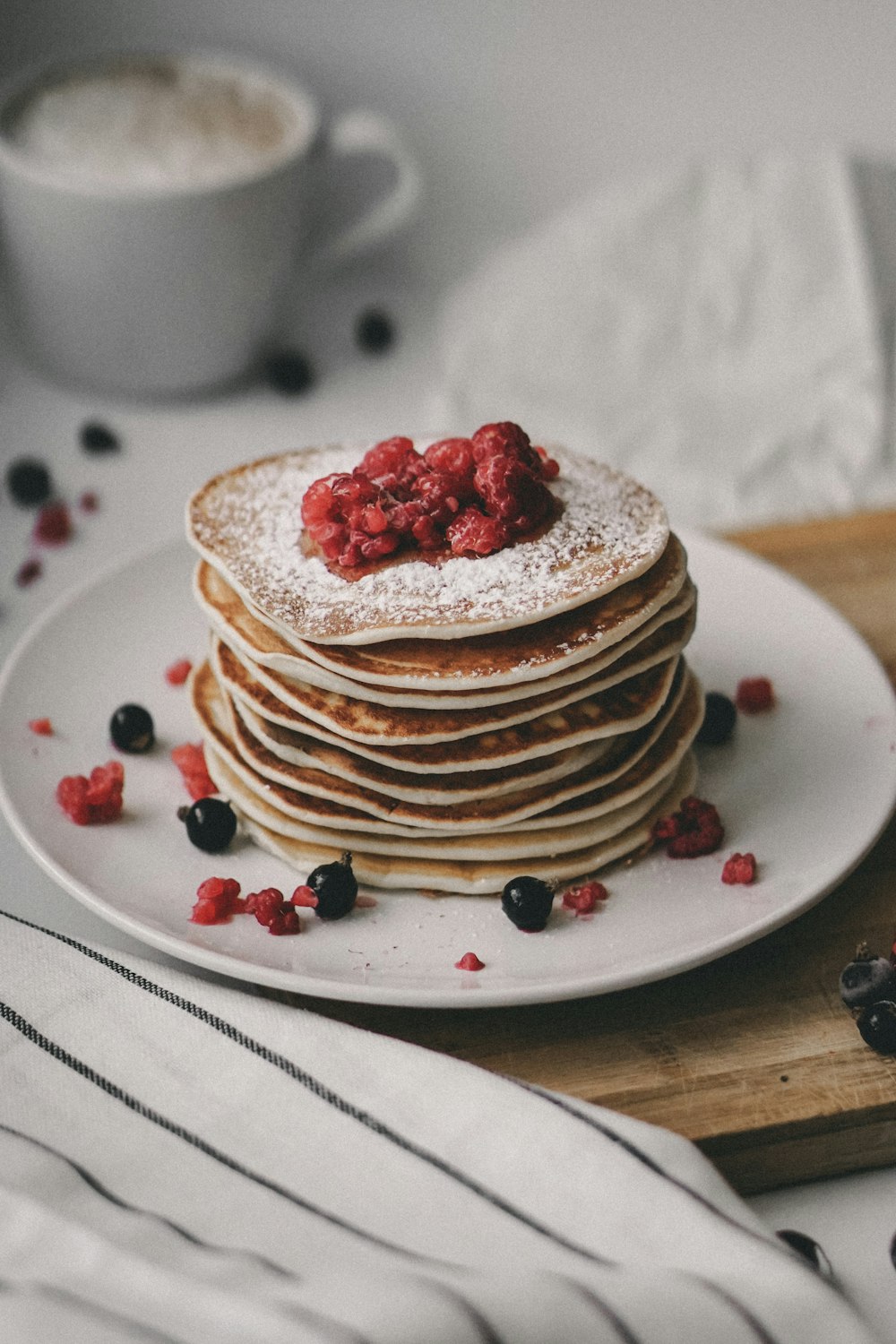 brown and white round cake on white ceramic plate