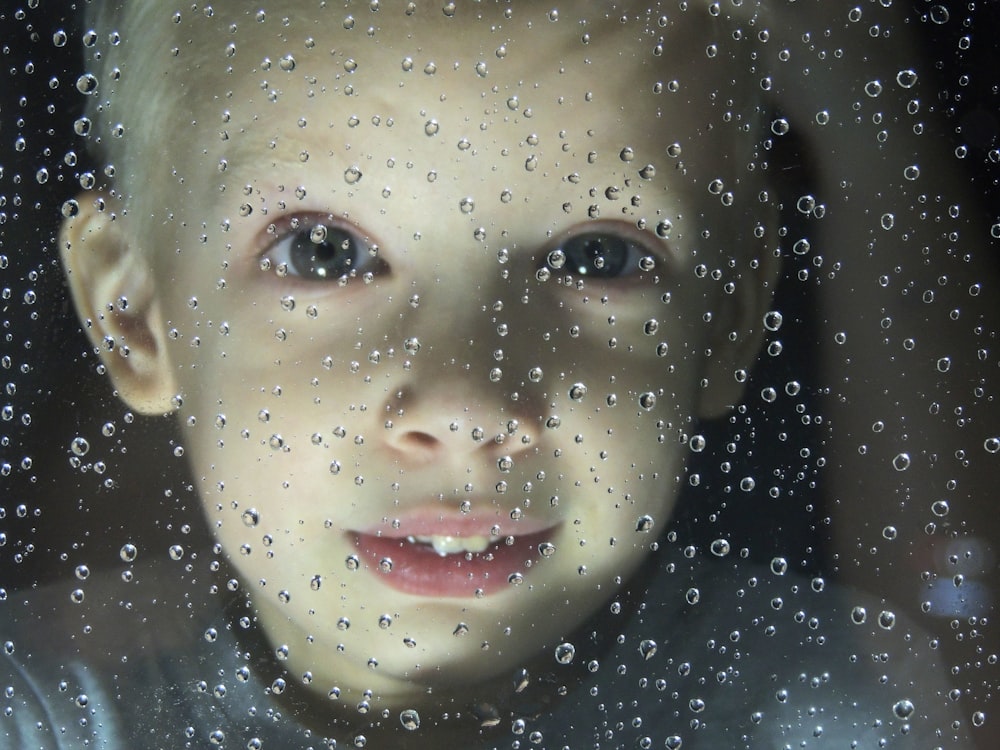 girls face with water droplets