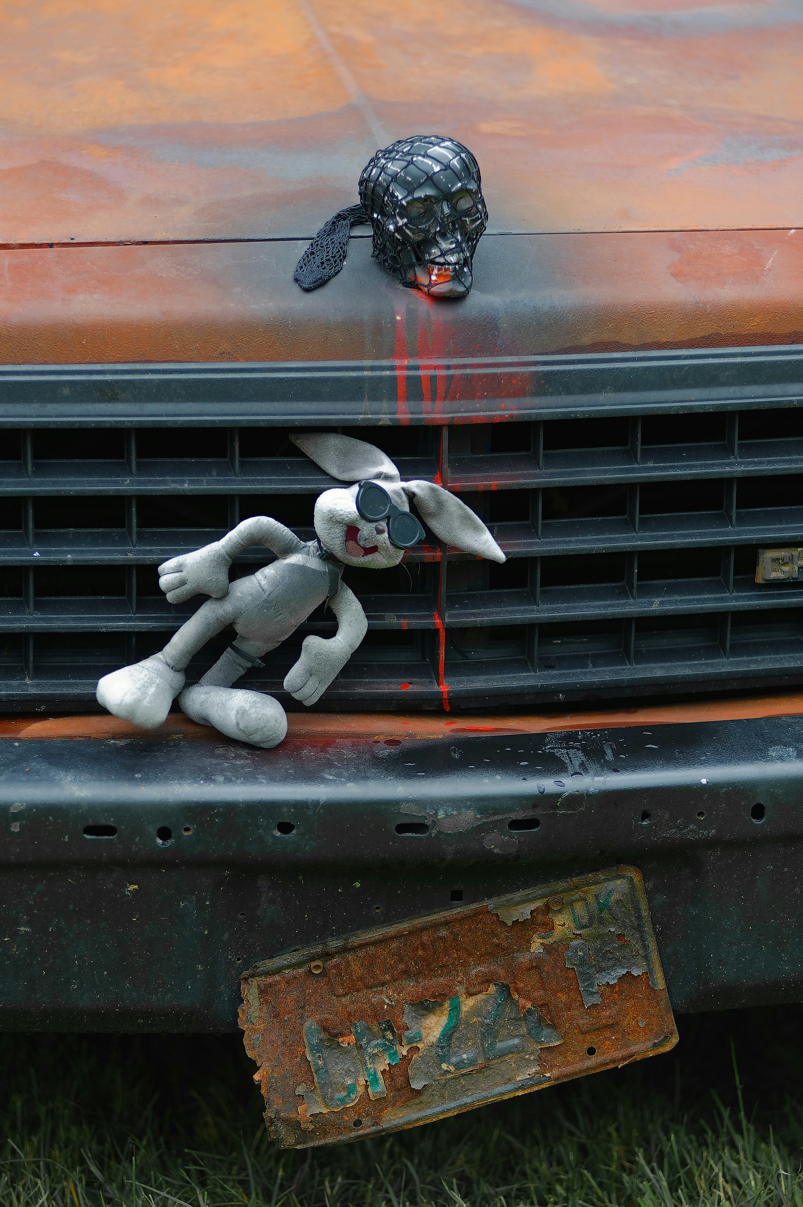 white and gray rabbit plush toy