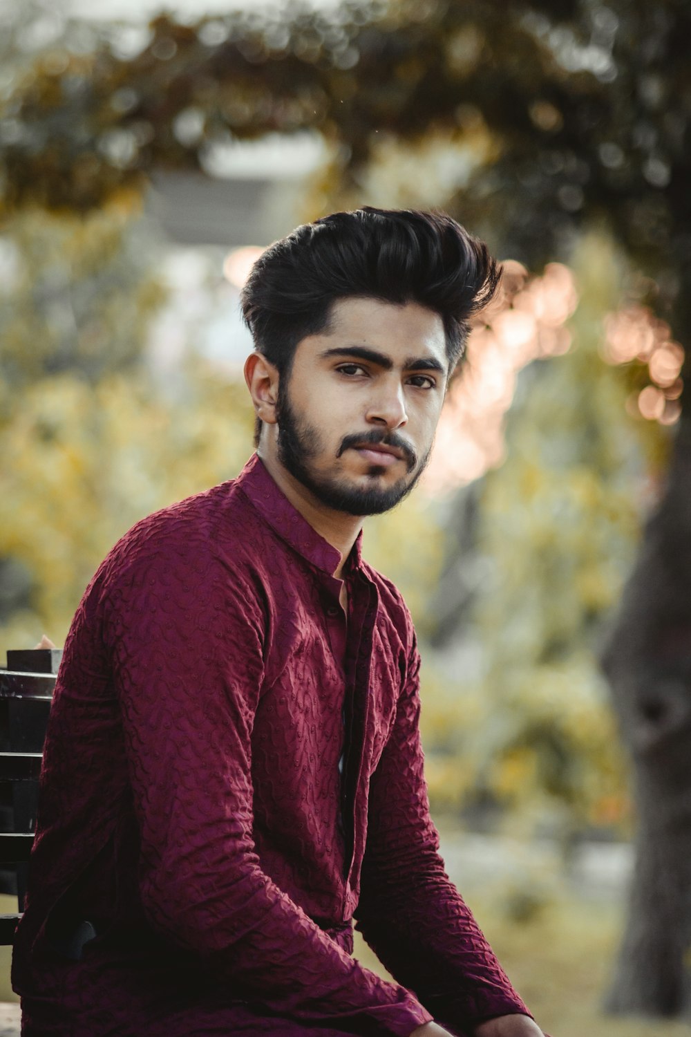 man in red dress shirt