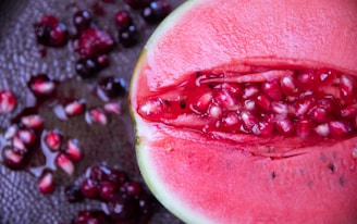 red sliced watermelon in close up photography