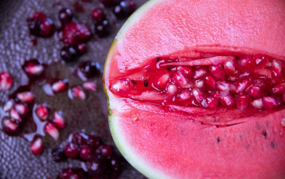 red sliced watermelon in close up photography