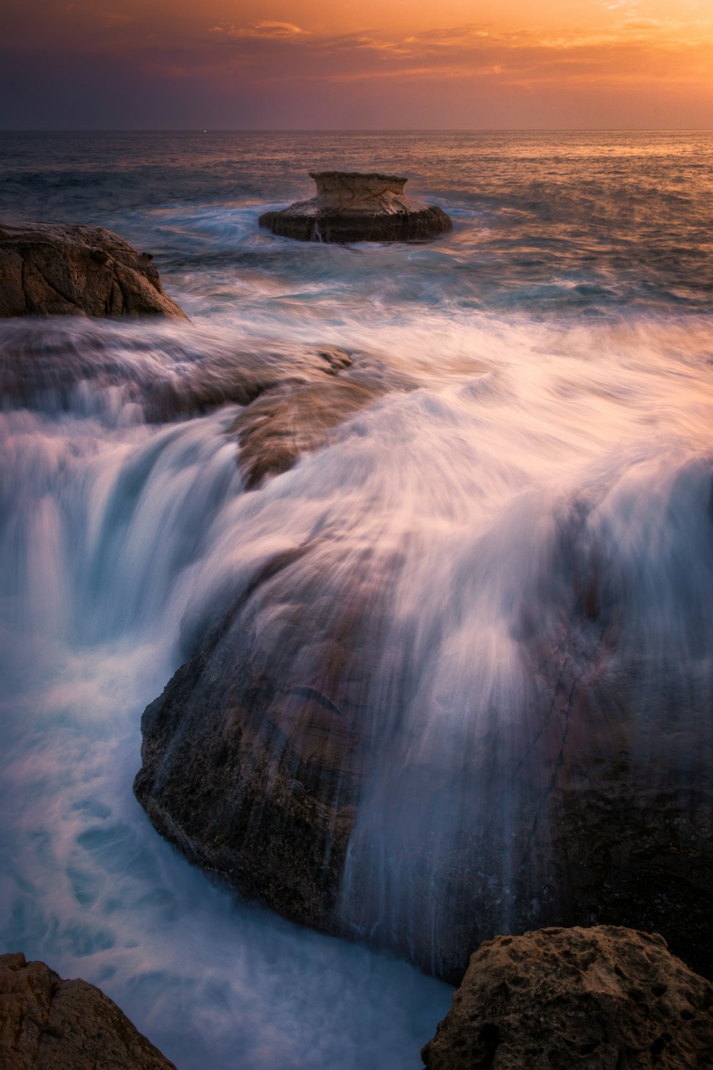 time lapse photography of water falls