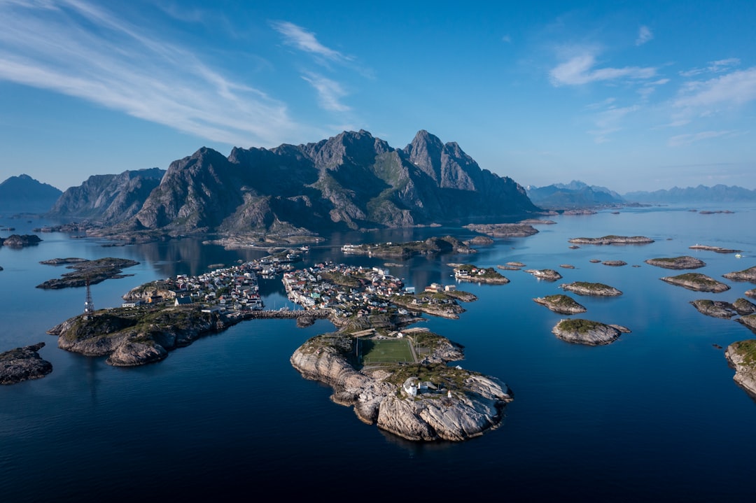 aerial view of lake and mountains during daytime