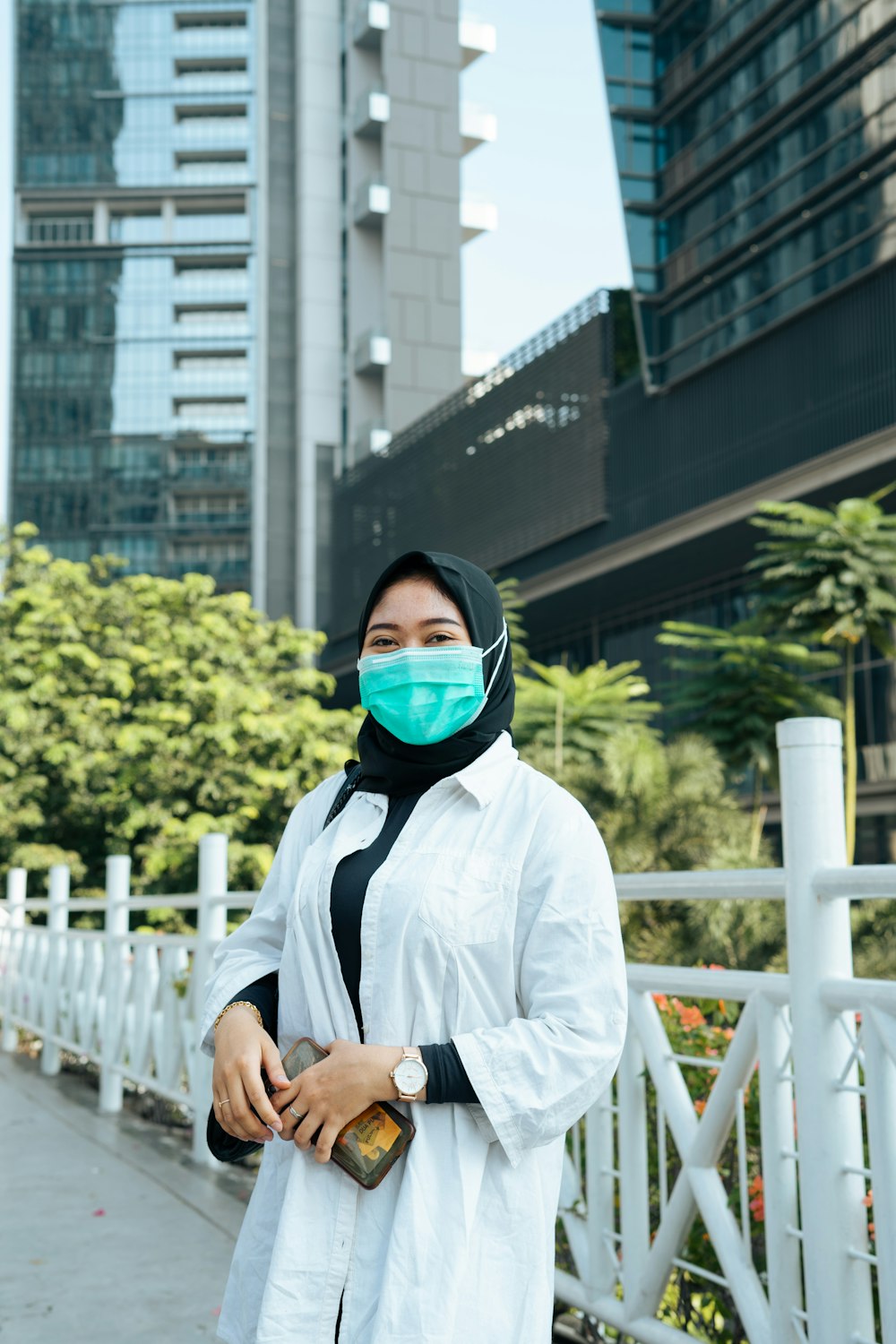 man in white jacket wearing blue goggles