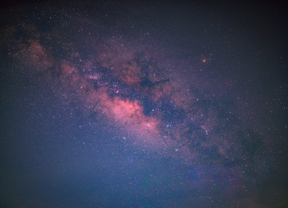 blue and red starry night sky