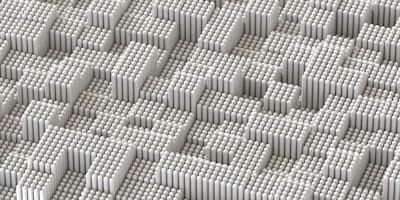A pattern of densely packed, vertically aligned cylindrical shapes creating an abstract, geometric landscape. The arrangement forms a textured surface with varying heights, reminiscent of a futuristic cityscape or digital terrain.