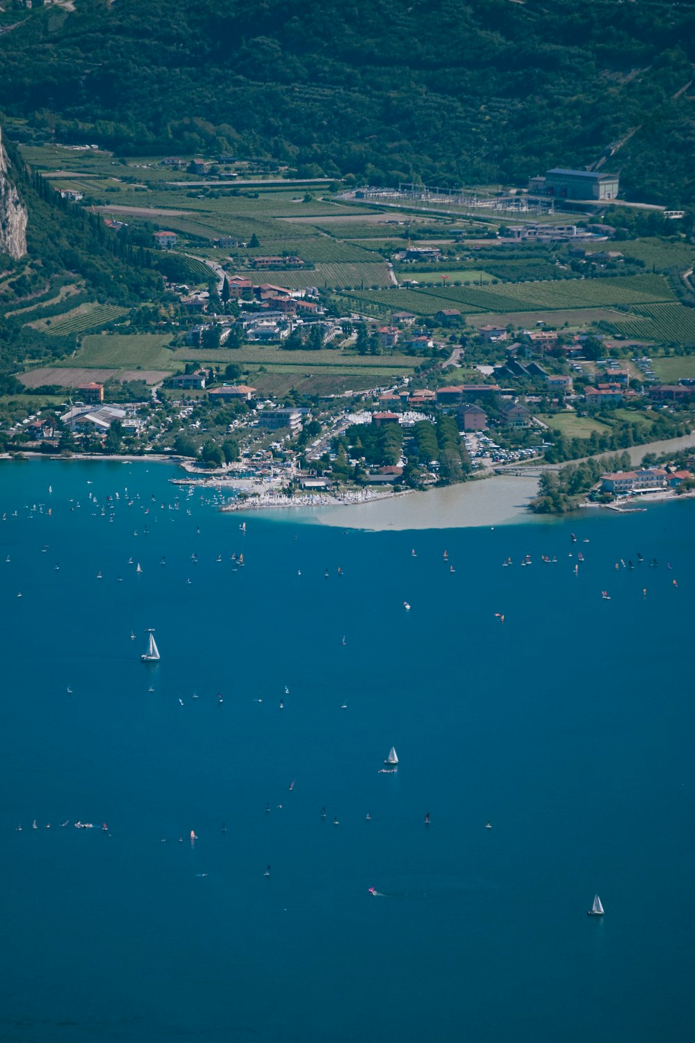 aerial view of city near body of water during daytime