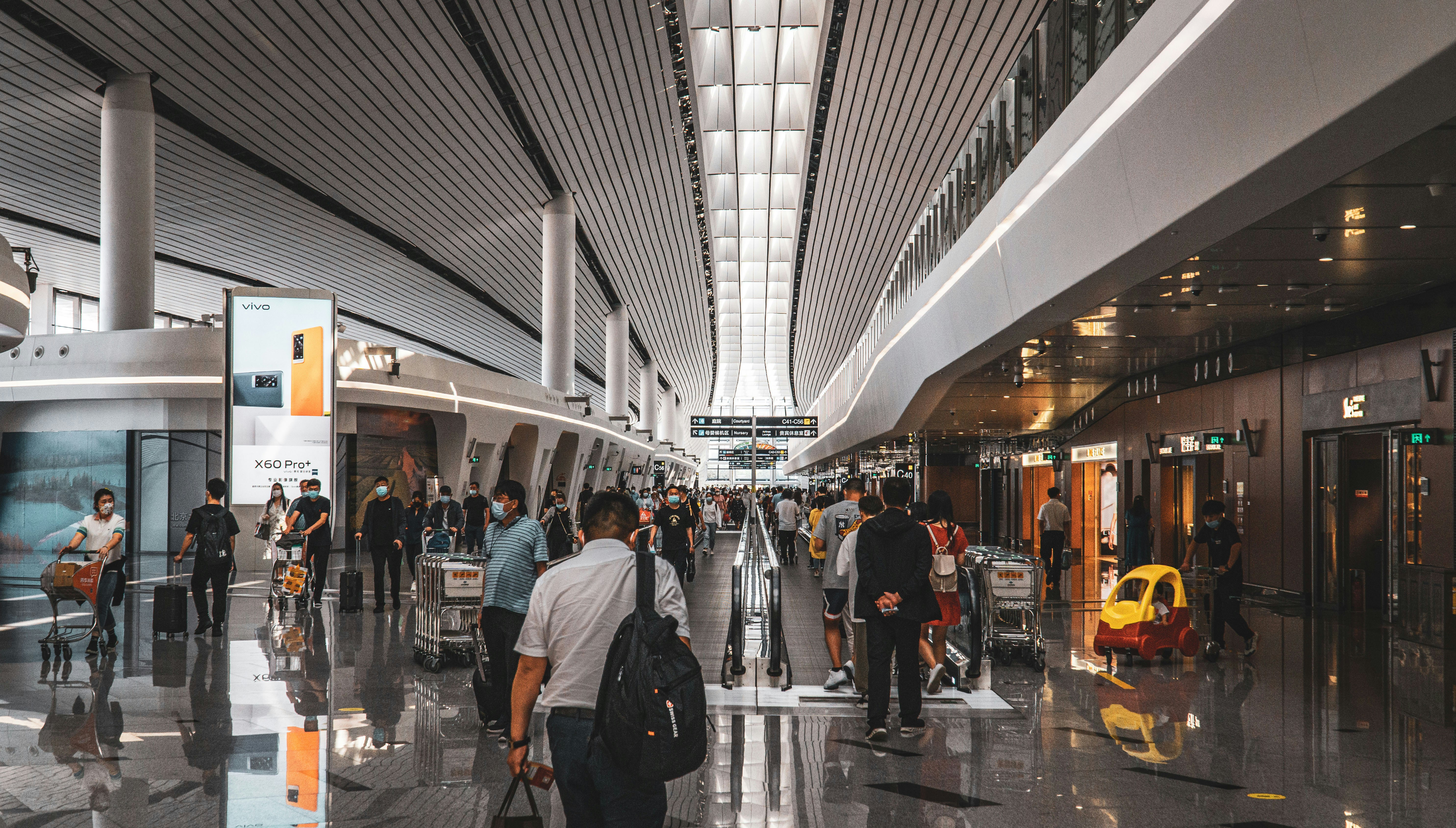people walking on train station during daytime, 