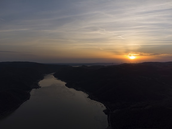 A scenic view of the Chipola River at sunset.