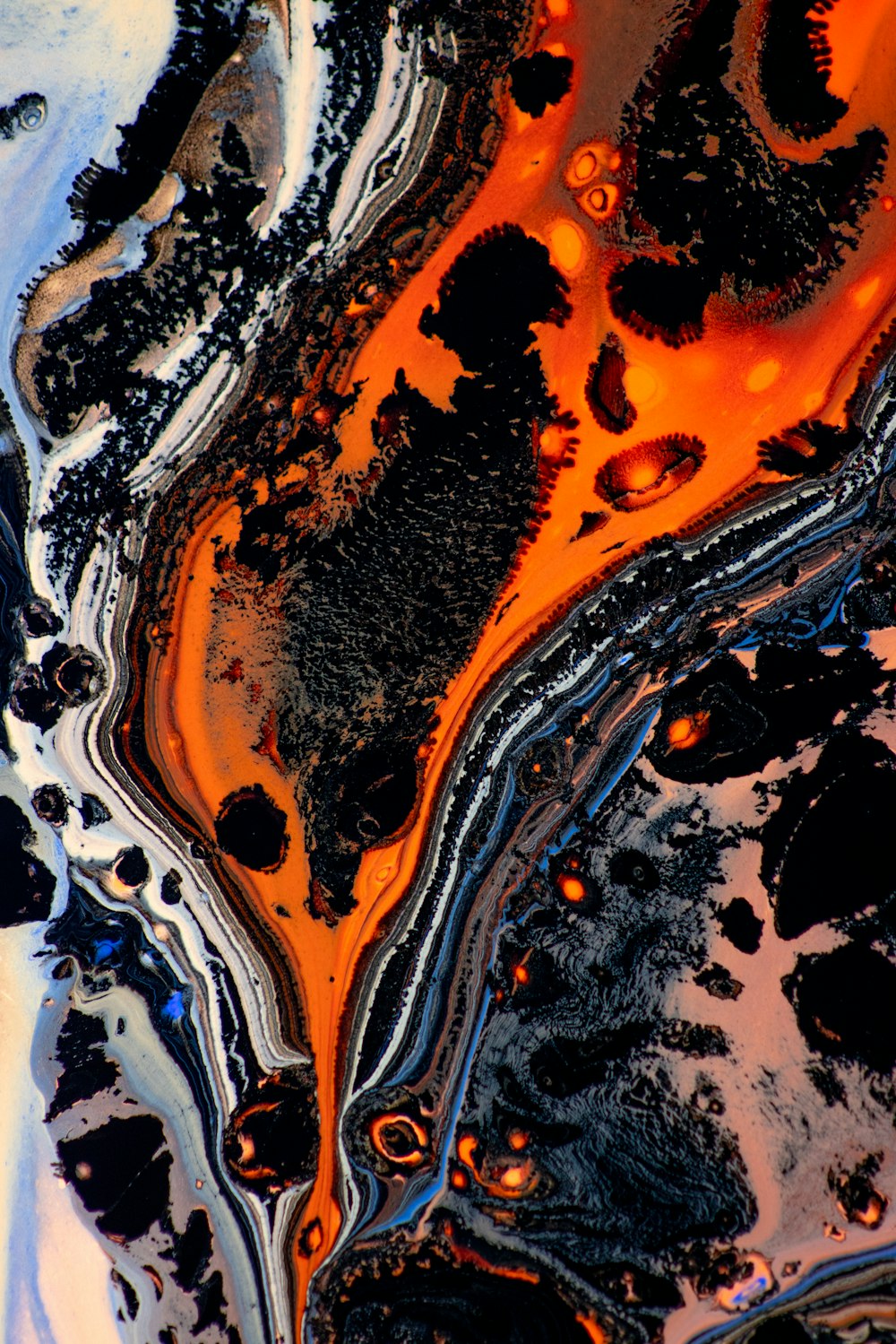 white black and orange abstract painting