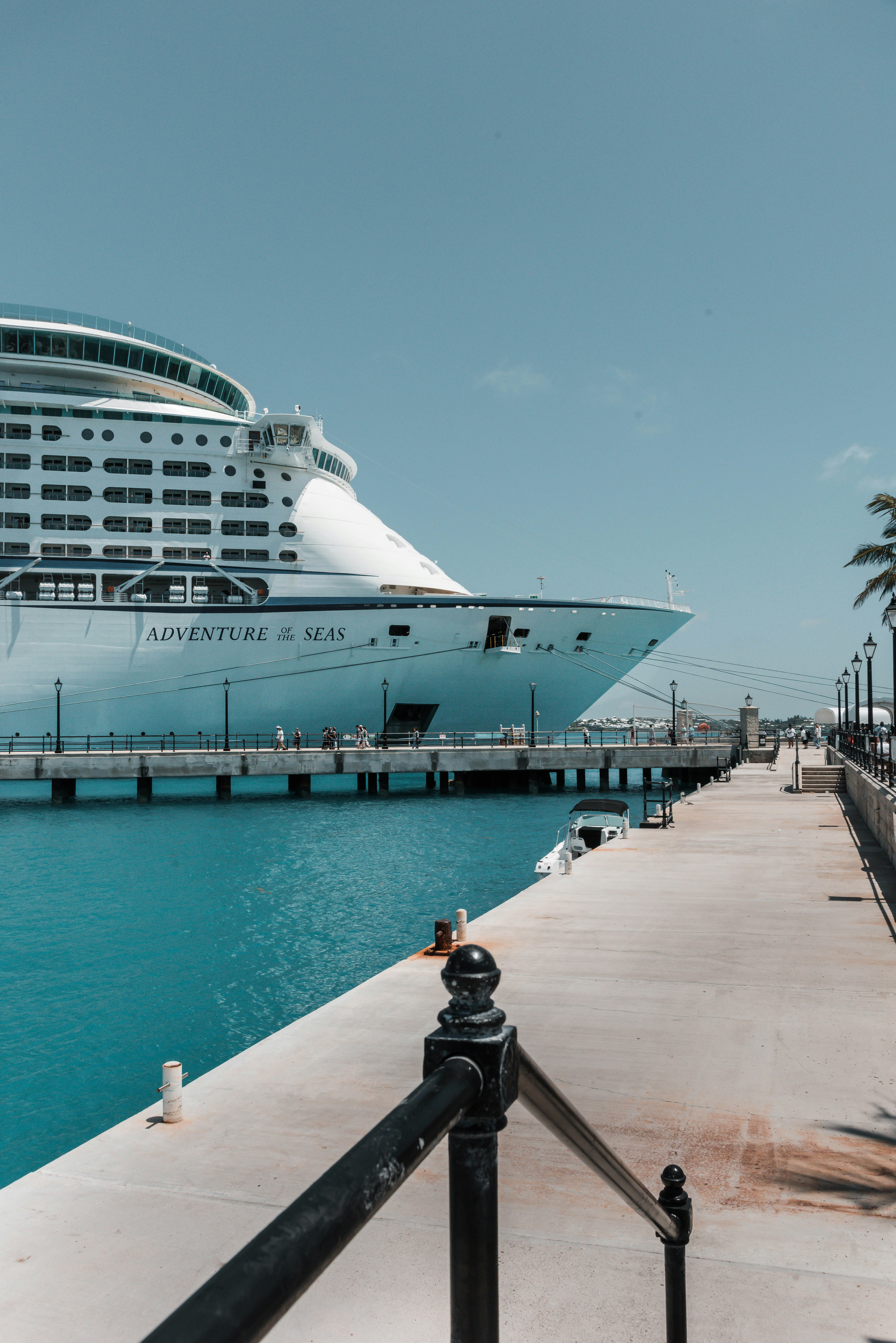 white cruise ship on dock during daytime