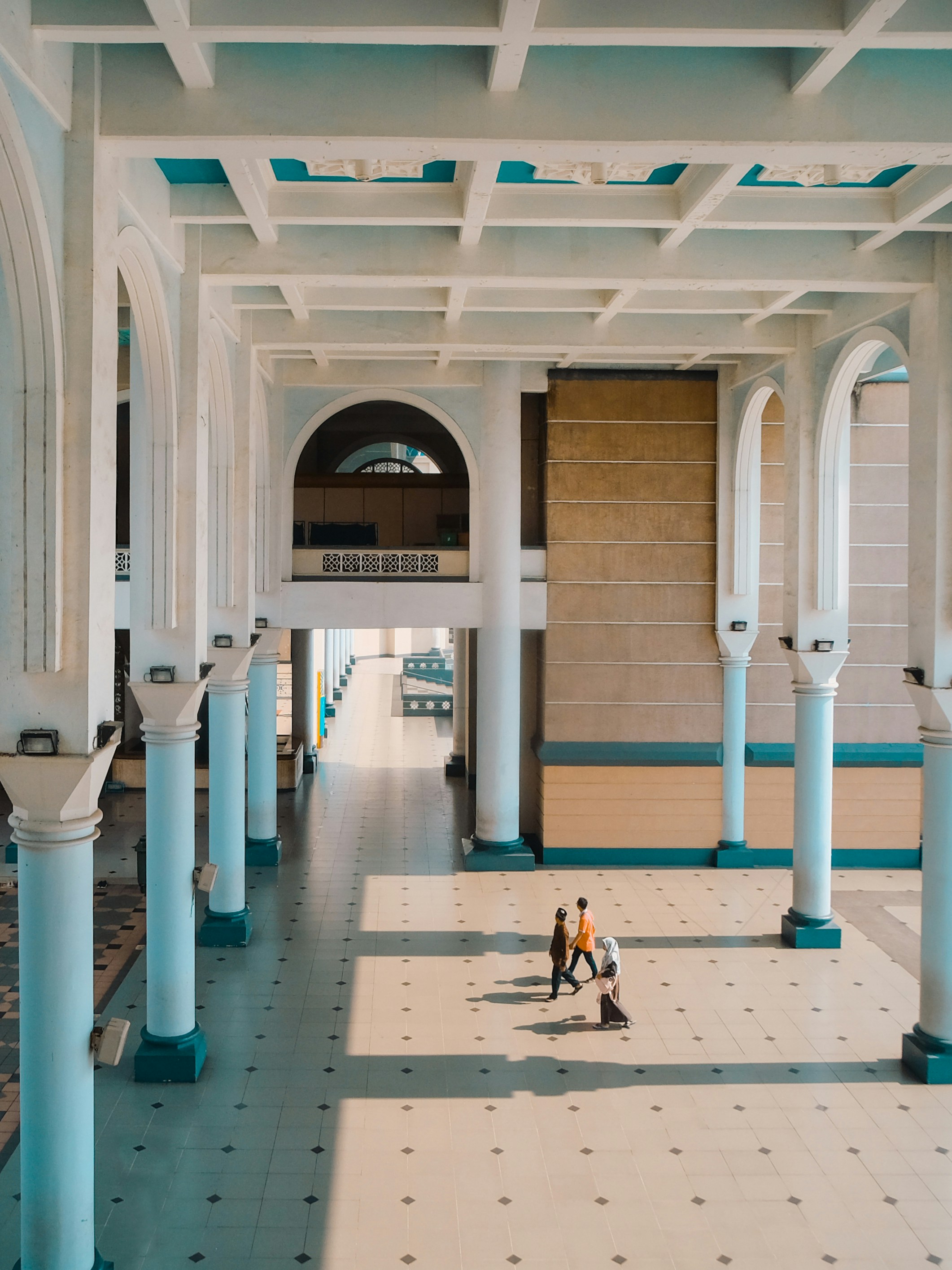 Muslim family praying together
