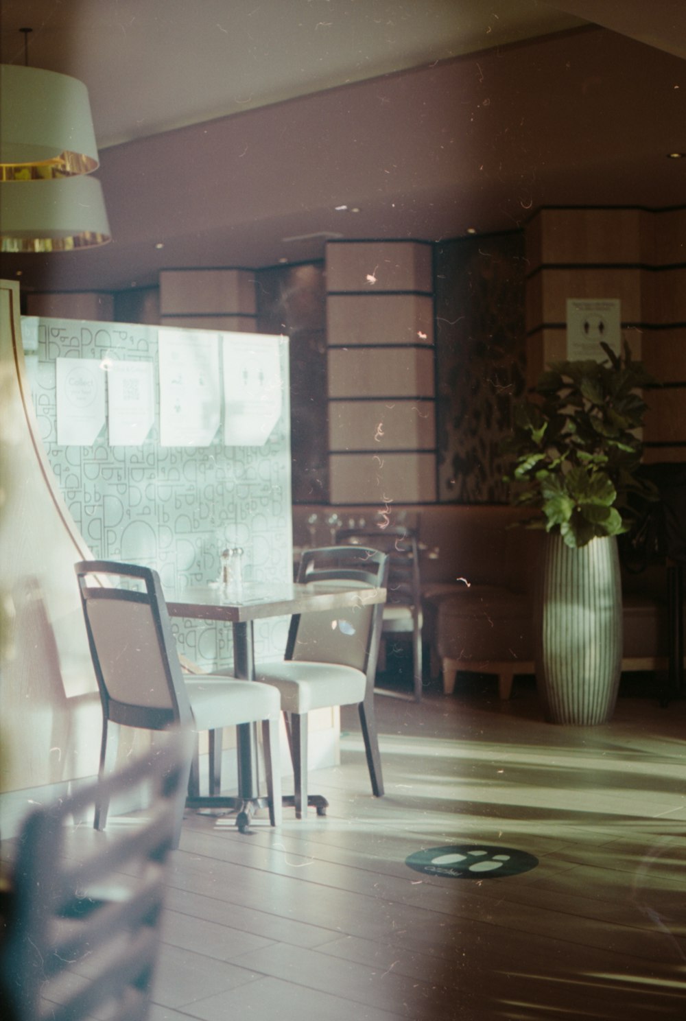 white wooden table and chairs