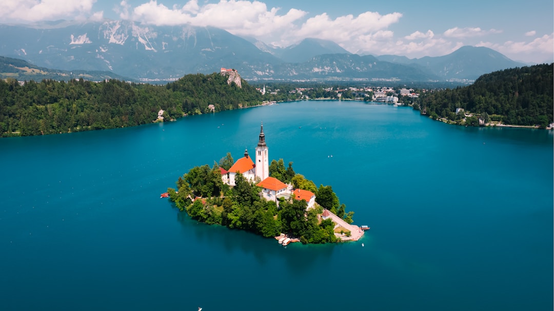Lake Bled with its island church and surrounding Slovenian hills