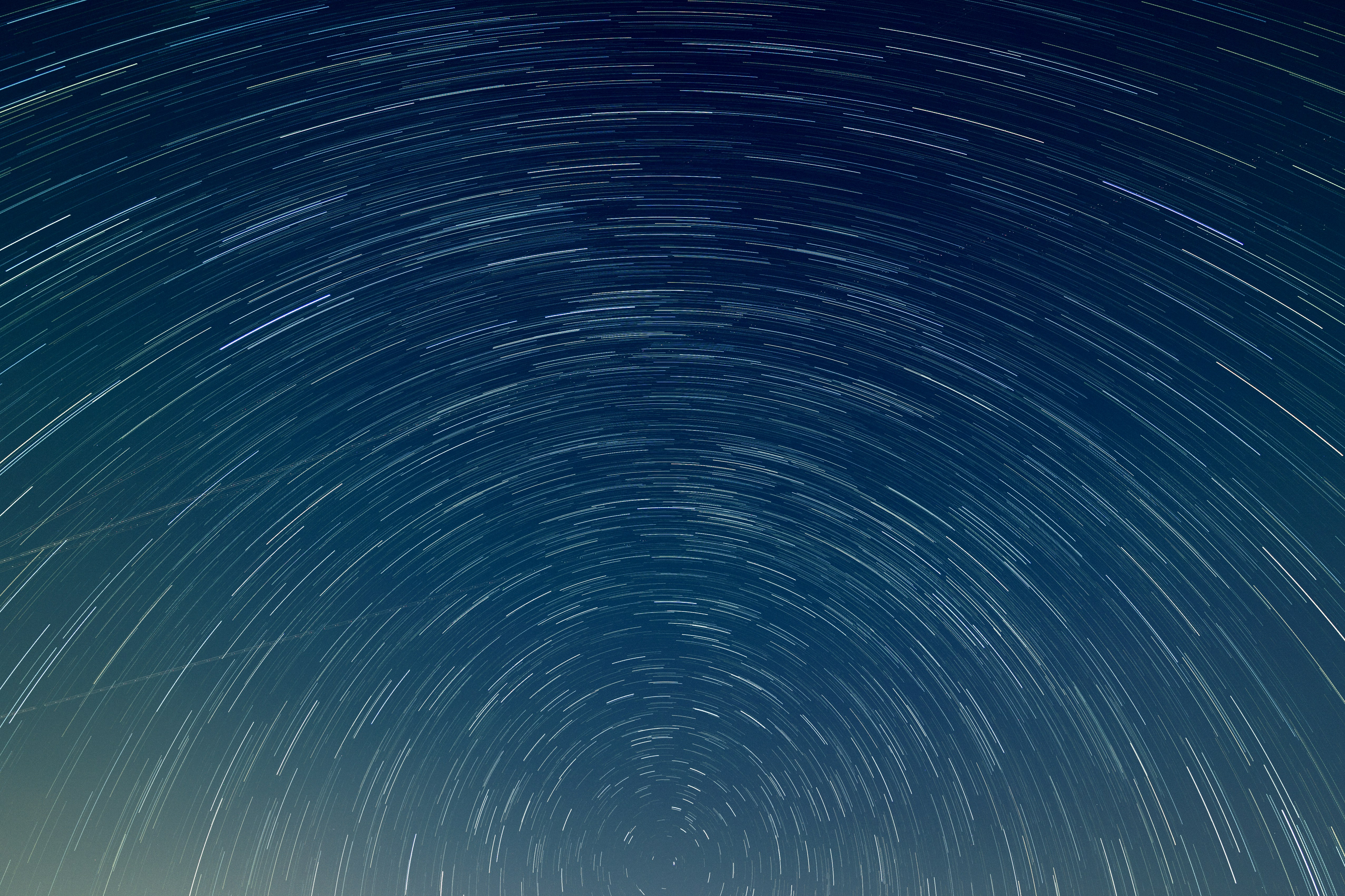 time lapse photography of stars, Polaris in the metropolis’s midnight sky. Set camera on the rooftop with a long-exposure interval timer, before went into the shower.