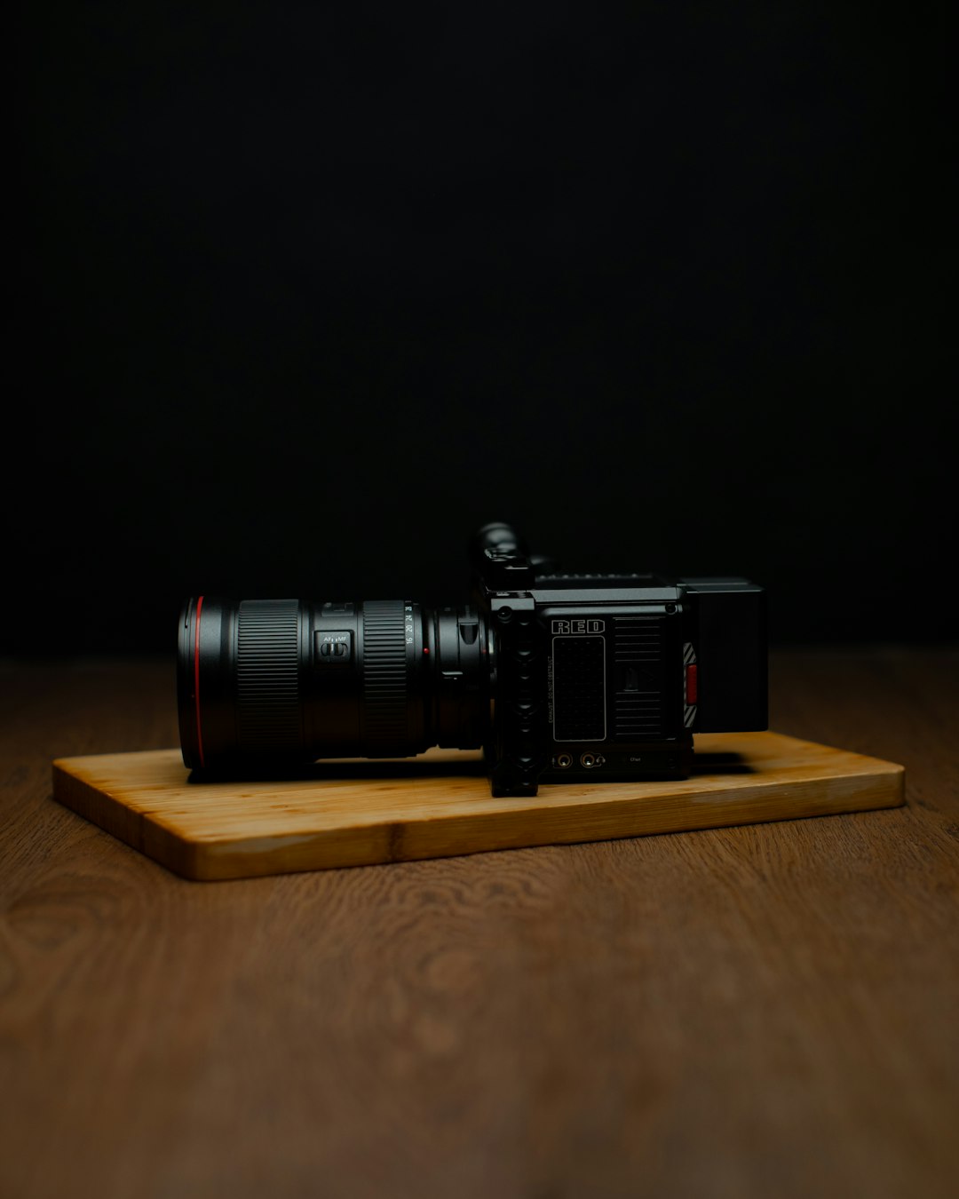black camera on brown wooden table