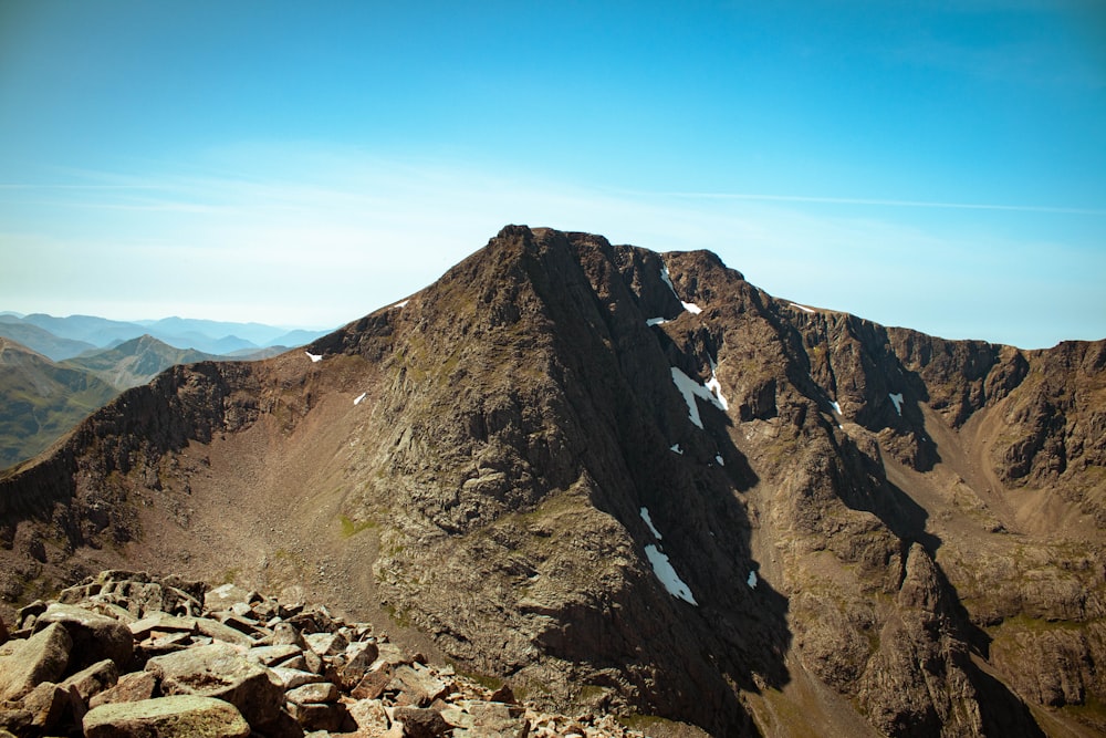 brown and gray mountain under blue sky during daytime