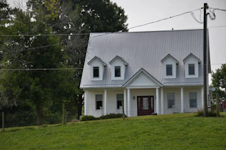 white and gray concrete house
