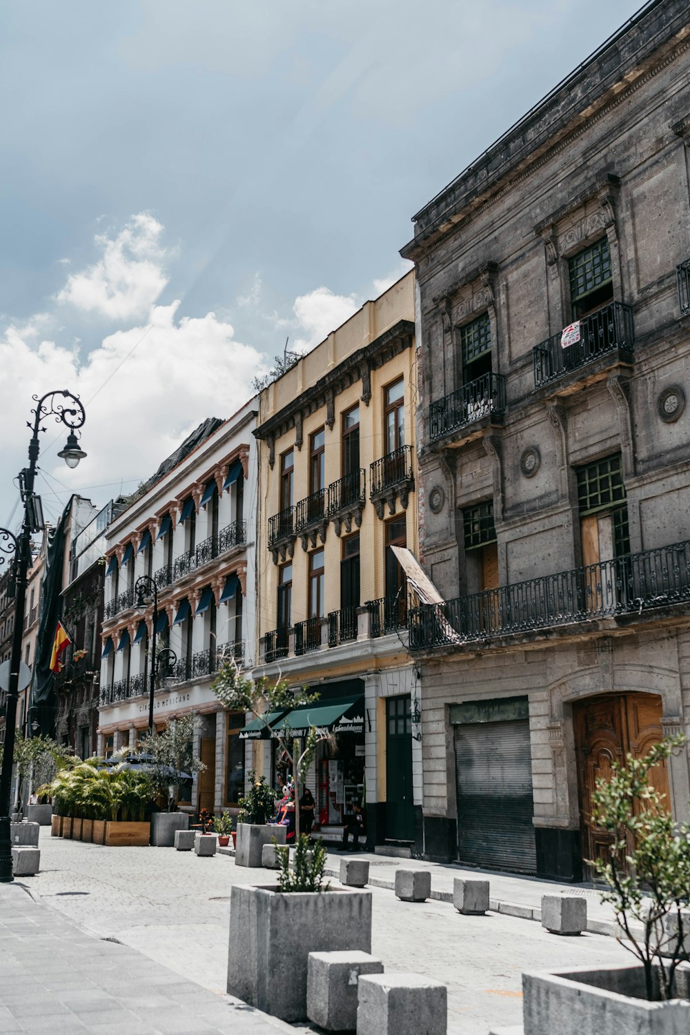 a street scene with a building and a street light