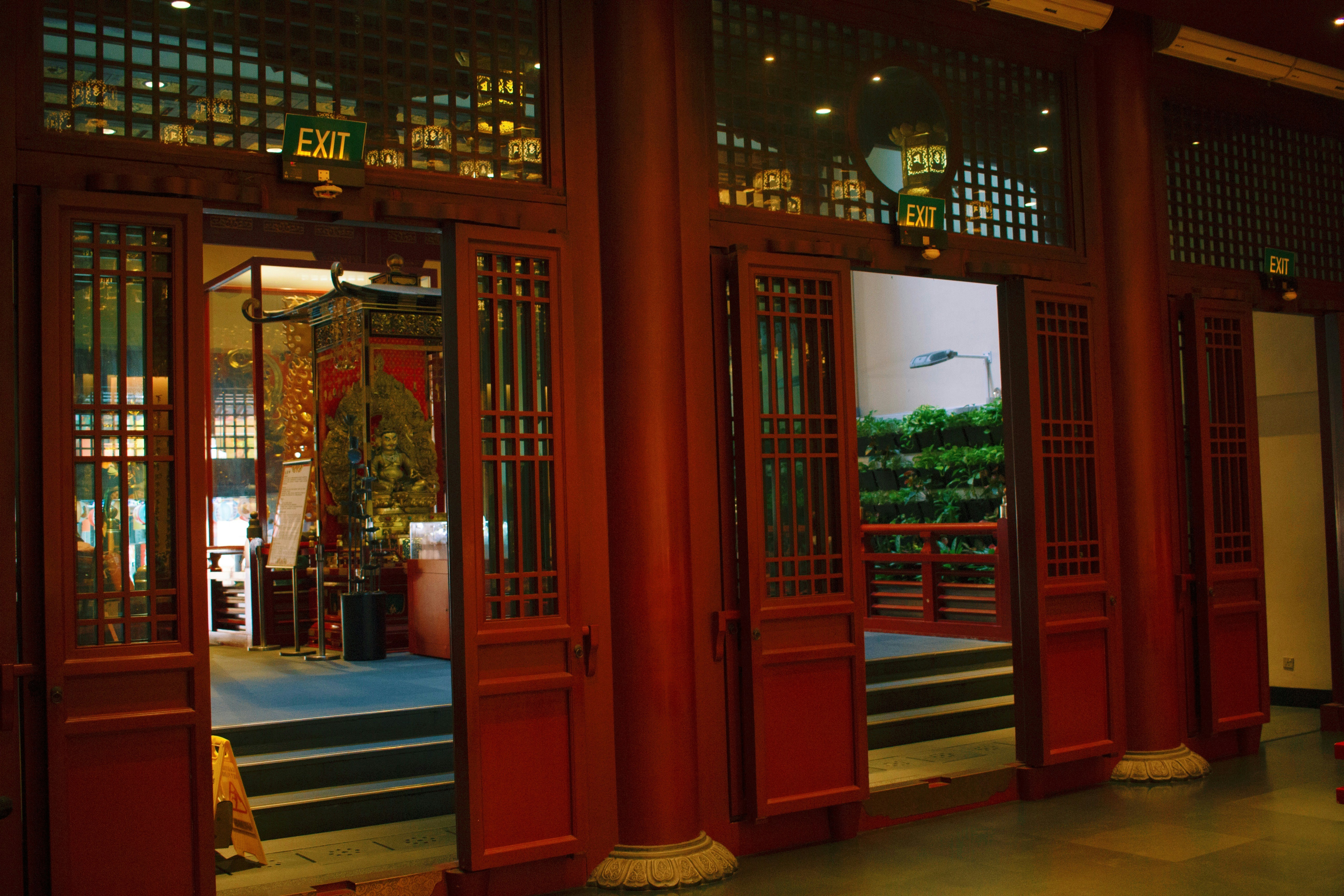brown wooden door with glass panel